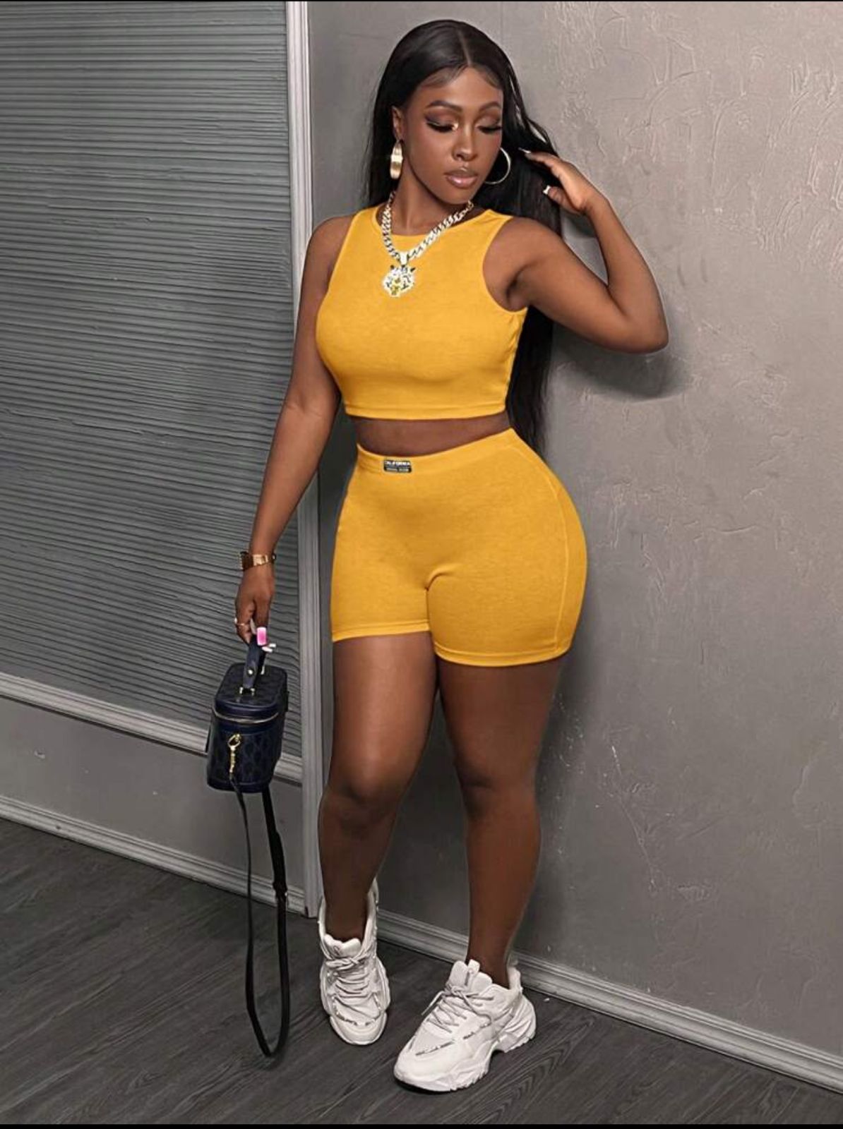 Yellow fit clothing tights and top Cute outfit ladies shorts set $3500 JMD